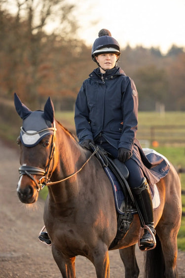Buy the LeMieux Navy Amelie Waterproof Lightweight Riding Coat | Online for Equine